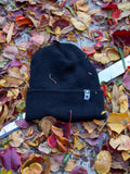 STAR TAG BEANIE IN BLACK