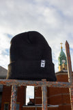 STAR TAG BEANIE IN BLACK